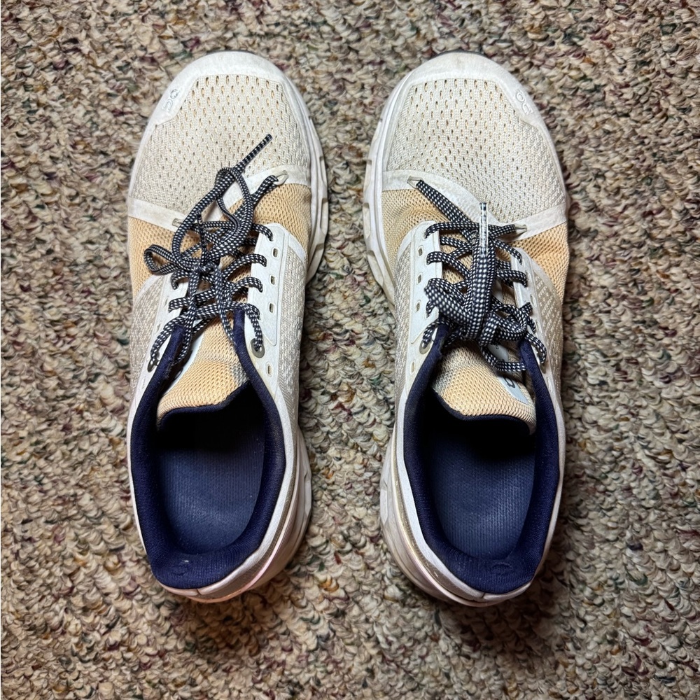 On Running White and Tan Sneakers